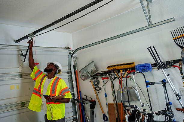 Professional Garage Door Panel Replacement technician working in Sharpsville, PA